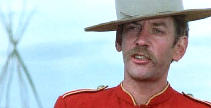 Donald Sutherland as Sgt. Dan Candy in Dan Candy's Law (1974)