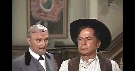 Jack Cassidy as Roger Hand and Noah Beery Jr. as Eddie don't see eye to eye in The Cockeyed Cowboys of Calico County (1970)