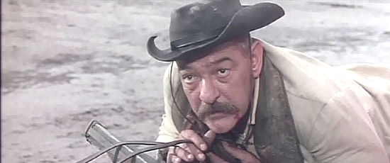 Livio Lorenzon as a wounded bandit who says a song and dance by Little Rita is the best way to depart life on earth in Rita of the West (1967)