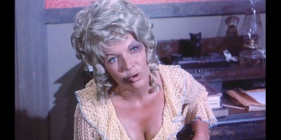 Brooke Tucker as Myra Lynn, the whore at Hooker's saloon in A Knife for the Ladies (1974)