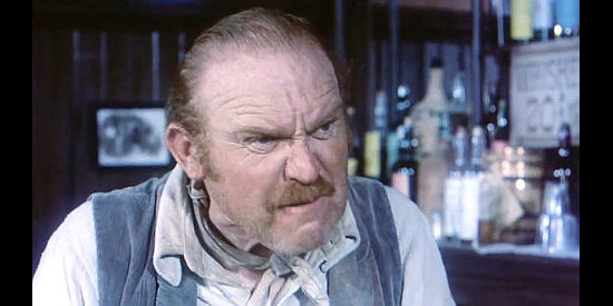 Gene Evans as saloon owner Virgil Hooker in A Knife for the Ladies (1974)