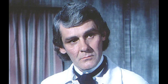 Richard Schaal as undertaker Orville Ainslie in A Knife for the Ladies (1974)