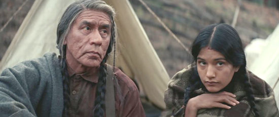Wes Studi as Chief Yellow Hawk with Tanaya Beatty as Living Woman in Hostiles (2017)