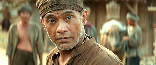 Donny Damara as Saker, father of Kiona and Sri in Buffalo Boys (2018)