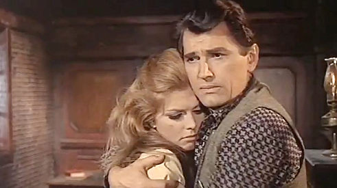 Edmund Purdom as Sheriff Roger Brown with Margaret (Micaela Pignatelli Cendali) in Gun Shy Piluk (1968)