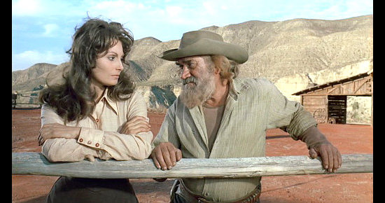 Jose Jaspe as Henneker warns Fan Dandridge (Rosanna Schiaffino) about Noon in The Man Called Noon (1973)