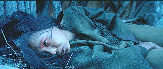 Melaw Nakehk'o as Powaqa, the Indian girl kidnapped by the French, in The Revenant (2015)