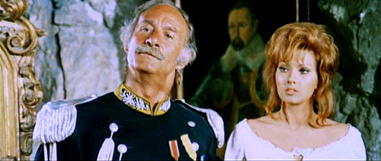 Alfredo Mayo as Gen. Lopez with pretty assistant Maria (Helga Line) in Those Dirty Dogs (1973)