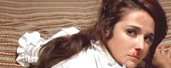 Cristina Galbo as Julietta Campos feels her brother's wrath in Ride for a Massacre (1967)