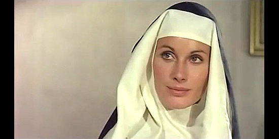 Gabriella Farinon as Sister Angela appeals to a bounty hunter in For a Book of Dollars (1973)