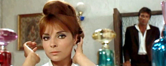 Maria Cuadra as Roselyn prepares herself for an expected visitor in Ride for a Massacre (1967)