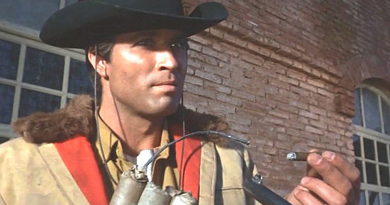 Peter Martell (Pietro Martellanza) as Alex Mitchell about to ignire a fistful of dynamite in Two Crosses at Danger Pass (1967)