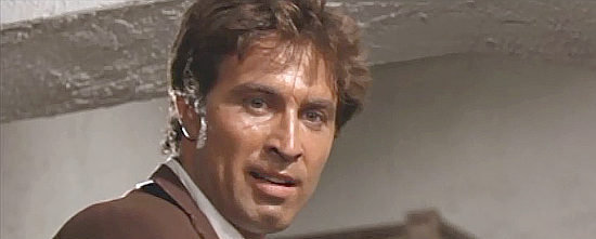 Peter Martell (Pietro Martellanza) as Rodrigo Campos, delivering a lesson in family loyalty in Ride for a Massacre (1967)