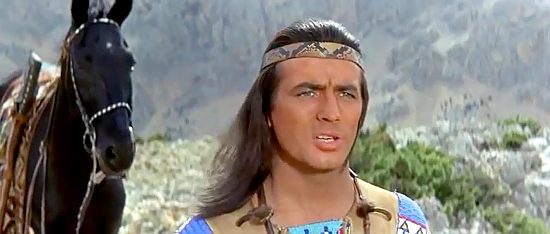 Pierre Brice as Winnetou warns of impending trouble in Flaming Frontier (1965)