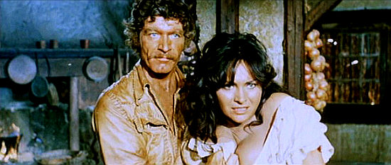 Stephen Boyd as Capt. Chadwell squeezing a peon's wife (Gabriella Giorgelli) for information in Those Dirty Dogs (1973)