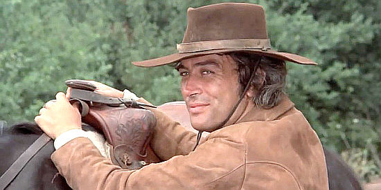 Andres Resino (Bud Randall) as Mark Tabor, ready to ride off to Denver in Anything for a Friend (1973)