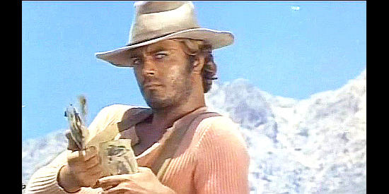 Antonio Cantafora (Michael Coby) as Coby, splitting up the loot in Carambola (1974)