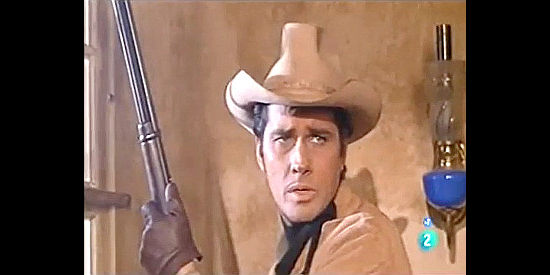 Brett Halsey as Johnny Ringo, prepared to defend his prisoner in Kill Johnny Ringo (1966)