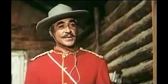 Guillermo Mendez as Capt. Jackson presents Kitosch with options in Kitosch, the Man Who Came from the North (1967)