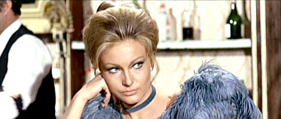 Helen Chanel as Dolly, wondering if Silver's doing his job too well in Killer Caliber .32 (1967)