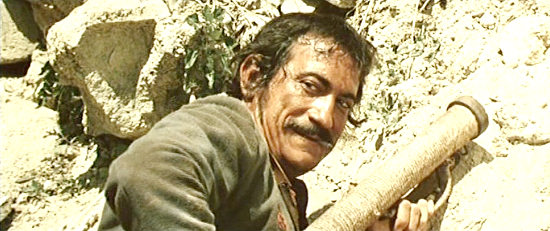 Leo Anchoriz as Decker with his explosives launcher in Kill Them All and Come Back Alone (1968)