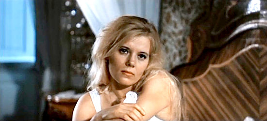 Ludmila Senchina as Julie Prudomme, the singer and entertainer in Armed and Dangerous (1978)