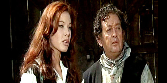 Maria Elena Arpon as Beatrice Lohsman and her father (Jose Luis Zalde) wonder about a stranger in Tequila (1973)