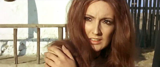 Marisa Rabissi (Marina Mulligan) as Jessica Diamond flinches under the whip of a villainess in Gunman of 100 Crosses (1971)
