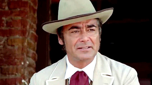 Alberto Farnese as Carl Parker, the man with Goldfield under his thumb in Fighters of Ave Maria (1970)