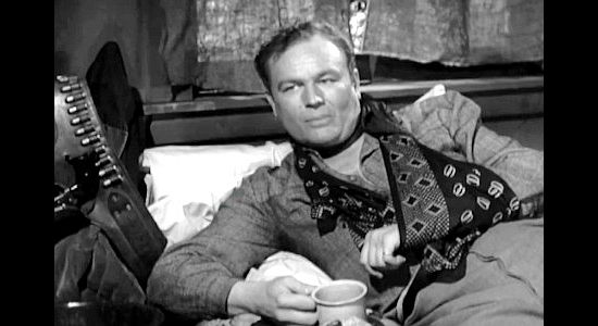 James Alexander as Rollie Burt, a wounded gunman Haney helps escape sure death in Soledad in Treasure of Ruby Hills (1955)