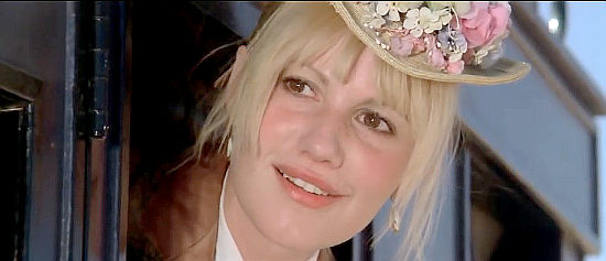 Miou-Miou as Lucy, the pretty partner in A Genius, Two Partners and a Dupe (1975)