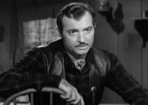 Zachary Scott as Ross Haney, planning to use water rights to take over a town in Treasure of Ruby Hills (1955)