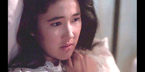 Alice Carter as Yen Sun, aka China, Murphy's woman in Young Guns (1988)