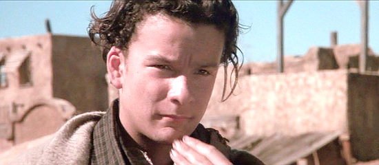 Balthazar Getty as Tom O'Folliard, the young man who looks up to Billy in Young Guns II (1990)