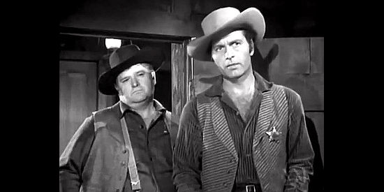 Charles Kemper as Deputy Gaffer and George Montgomery as Marshal Tom Jackson, closing in on their prey in Belle Starr's Daughter (1948)