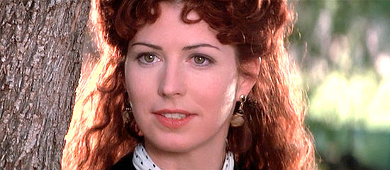 Dana Delany as Josephine Marcus, the actress who catches Wyatt's eye in Tombstone (1993)