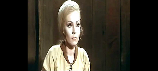 Dyanik Zurakowska as Helen Brice, worried about her husband Dale in $20,000 for Every Corpse (1971)