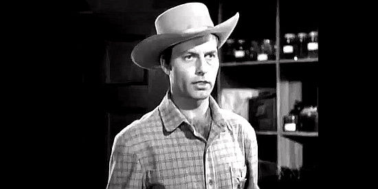 George Montgomery as Marshal Tom Jackson learns Rose's true identity in Belle Starr's Daughter (1948)