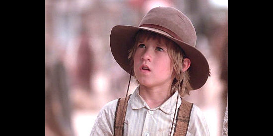 Haley Joel Osment as Davis Cable, son of Paul and Martha Cable in Last Stand at Saber River (1997)