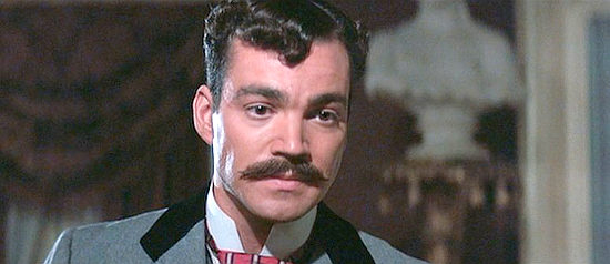 Jon Tenney as lawman John Behan, trying to appeal to Josephine's desire for comfort in Tombstone (1993)