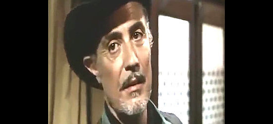 Juan Cortez as the railroad boss in $20,000 for Every Corpse (1971)