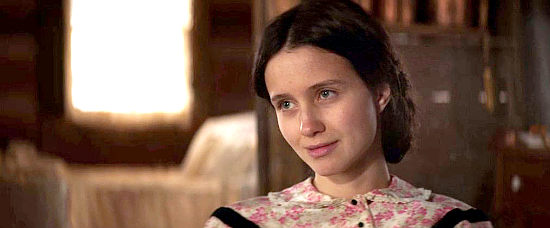 Julia Goldani Telles as Emma Harper, the new arrival attracted to Lizzy's husband in The Wind (2018)