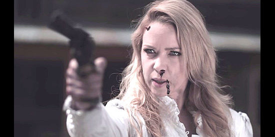 Karin Brauns as Ursula, showing off a gun and gumption in Once Upon a Time in Deadwood (2019)