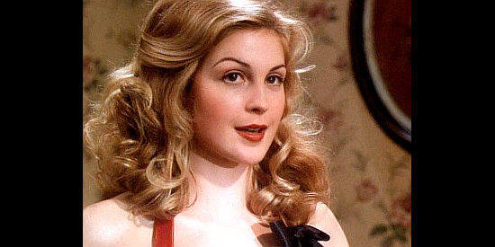 Kelly Rutherford as Dixie Cousins, preparing to use her saloon girl charm on Brisco in The Adventures of Brisco County Jr. (1993)