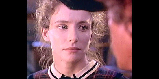 Leslie Hope as Liza Rigby, a Mormon woman locked in an unhappy marriage in Avening Angel (1995)