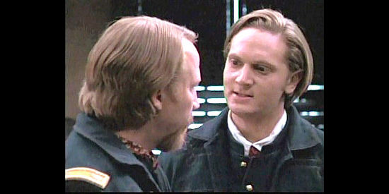 Matt Ross as Capt. Calhoun, providing a family history lesson to a fellow officer in Buffalo Soldiers (1997)