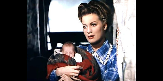 Maureen O'Hara as Louisa, imploring Bill to stay with her and their newborn son in Buffalo Bill (1944)
