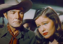 Randolph Scott as Tom Andrews with Nancy Olson as Cecille Gautier in Canadian Pacific (1949)