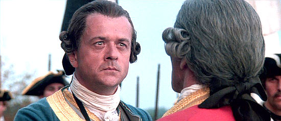 Patrice Chereau as Gen. Montcalm, negotiating surrender terms with Col. Munro in Last of the Mohicans (1992)