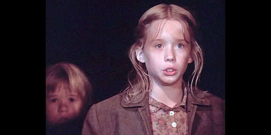 Rachel Duncan as Clare Cable, daughter of Martha and Paul Cable in Last Stand at Saber River (1997)